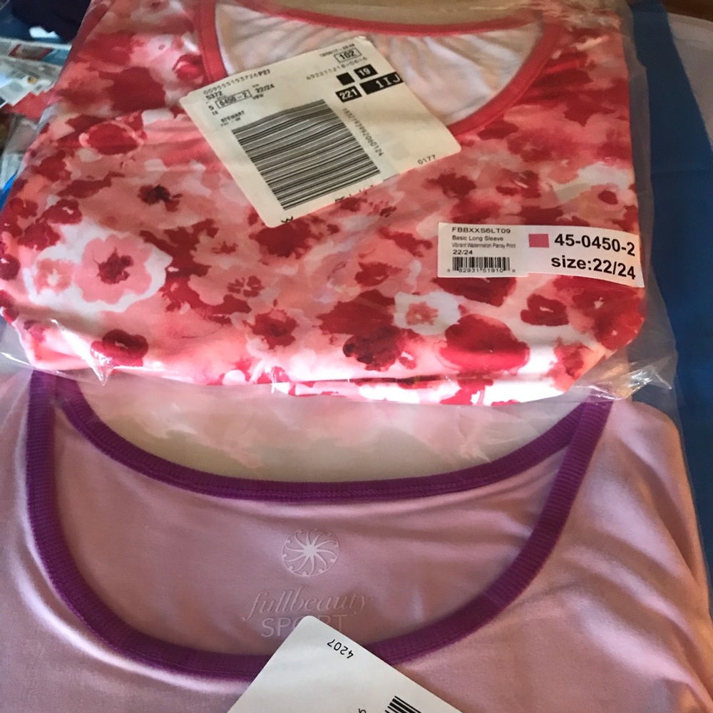 2 Women’s long sleeve t-shirts.